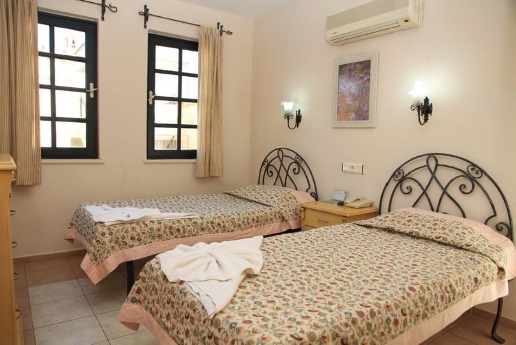 مرمريس T&G Apartments الغرفة الصورة